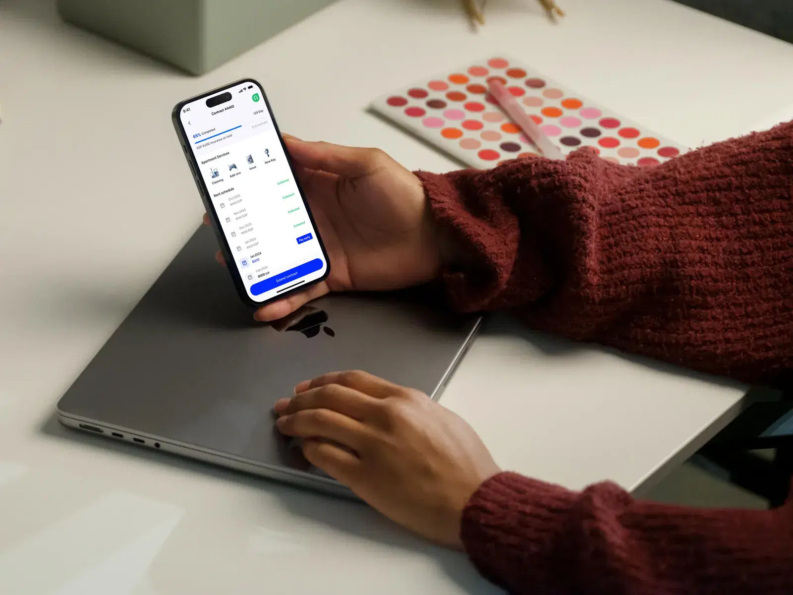 Renter checking their contract and rent schedule in the Roomz.rent app